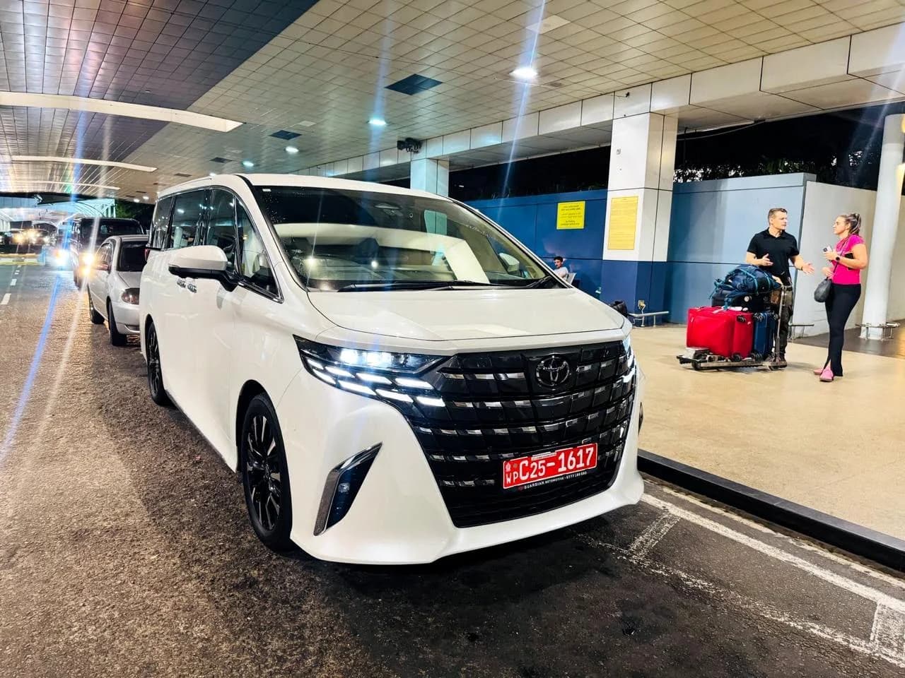 Premium MPV category at an airport pick-up area