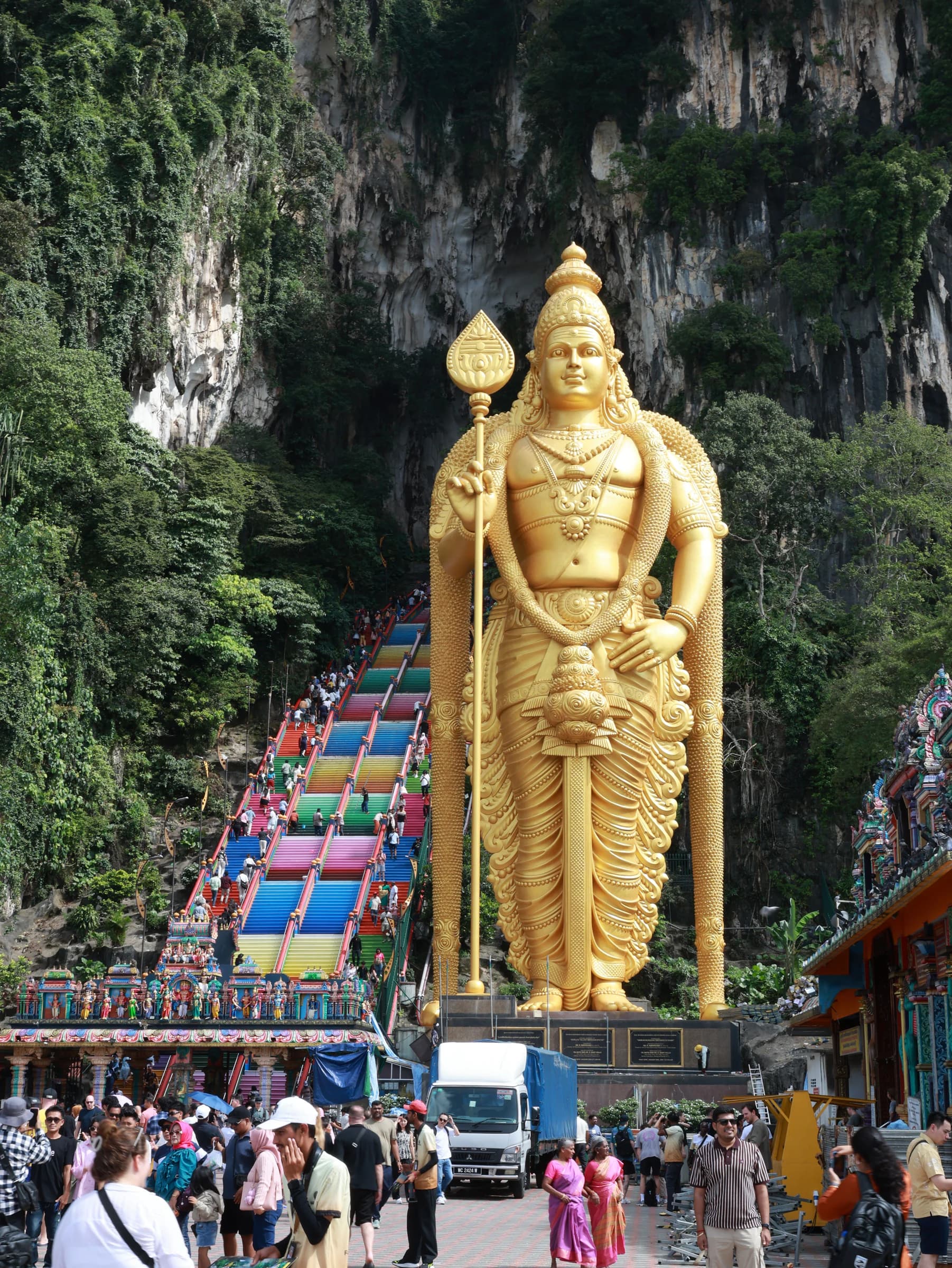 Golden Murugan statue at the entrance to Batu Caves