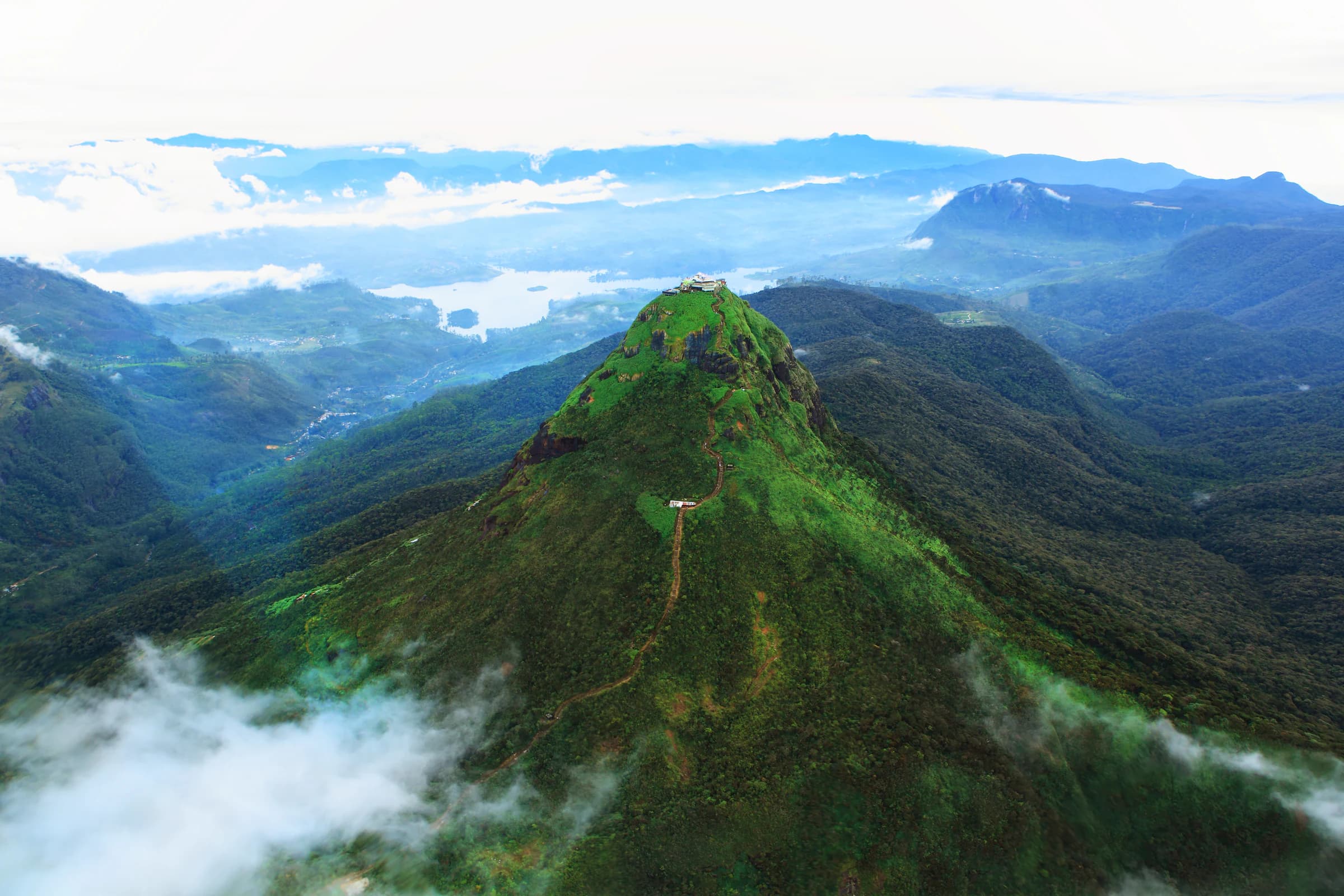 Adam’s Peak rising above a layer of clouds